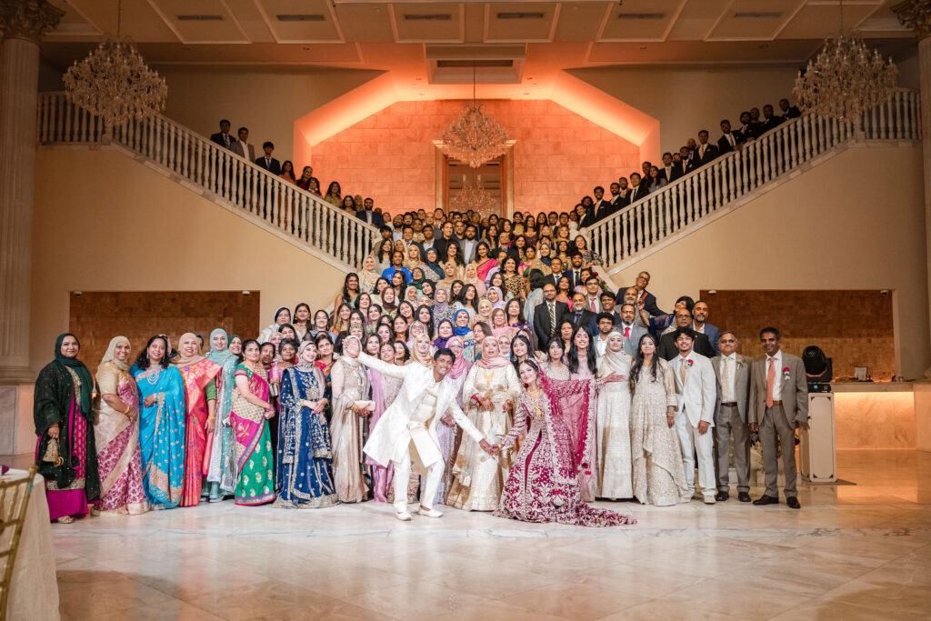 Family picture on the grand steps of the Bellevue in the grand ballroom